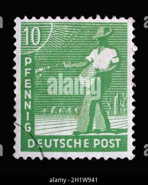 Stamp printed in Germany, American-British-Soviet Occupation (Trizone) shows Sower, circa 1948 Stock Photo