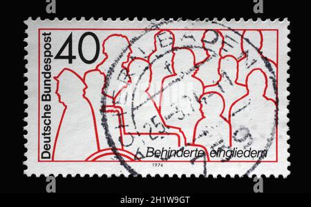A stamp printed in Germany shows Reintegration handicapped people, circa 1974 Stock Photo