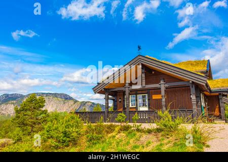 Norwegian wooden cabins cottages in the nature and mountain landscape of Treungen in Nissedal Norway. Stock Photo