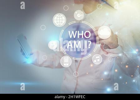 Hand writing sign Who Am I Question, Word Written on asking about self identity or an individualal purpose in life Inspirational business technology c Stock Photo