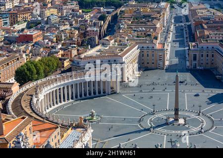 Vatican, Rome, Italy - October 9, 2020: Aerial view on Sait Peter's Square from dome of Saint Peter's Basilica. Few tourists due to the Covid-19 coron Stock Photo