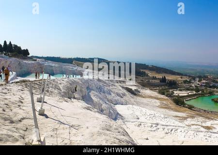 Travertines in Turkey. Calcite cliff of Pamukkale at sunny day Stock Photo