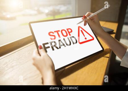 Stop Fraud banner on screen. Cybercrime and internet security concept. Stock Photo