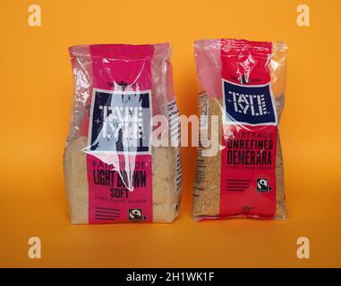 LIVERPOOL, UK - CIRCA JUNE 2021: Packet of Tate and Lyle light brown soft sugar and unrefined demerara pure cane sugar Stock Photo