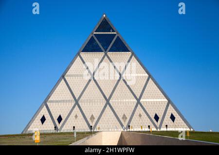 Nur Sultan, Kazakhstan - 05-01-2017: Also translated as Pyramid of Peace and Reconciliation. The palace is located in the green Presidential Park. Stock Photo