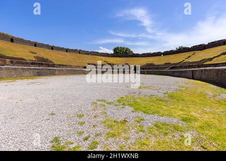 Pompeii, Naples, Italy - June 26, 2021: View on Amphitheatre of Pompeii  buried by the eruption of Vesuvius volcano in 79 AD. It is the oldest survivi Stock Photo