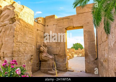 Statue seated in the corner, Karnak temple Stock Photo