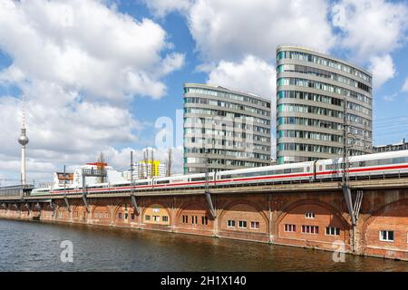 Berlin, Germany - April 23, 2021: ICE 2 high-speed train of Deutsche Bahn DB near Jannowitz bridge in Berlin, Germany. Stock Photo