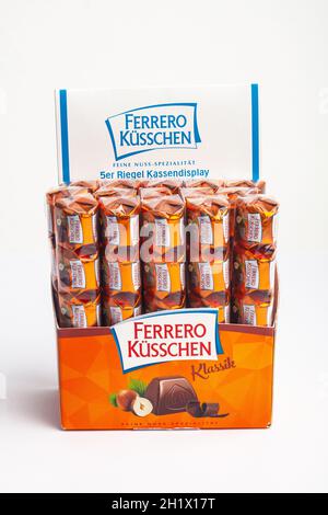 HUETTENBERG, GERMANY - 2021-07-24,   Box of Ferrero Kuesschen chocolates on white background. Ferrero is an Italian manufacturer of branded chocolate Stock Photo