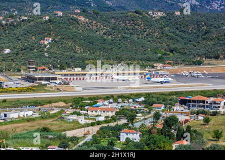 Skiathos, Greece - June 6, 2016: Overview Skiathos Airport (JSI) with terminal in Greece aerial view. Stock Photo