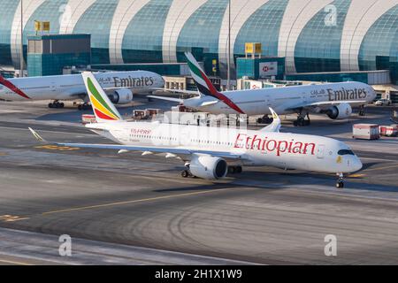 Dubai, United Arab Emirates - May 27, 2021: Ethiopian Airlines Airbus A350-900 airplane at Dubai airport (DXB) in the United Arab Emirates.