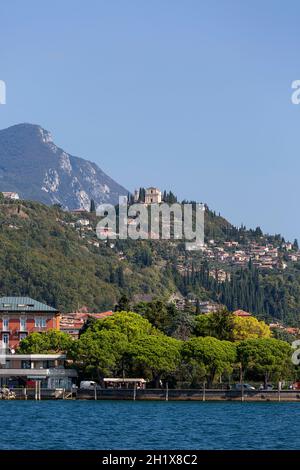 LAKE GARDA, ITALY - SEPTEMBER 30, 2018: Lake Garda, the largest lake in Italy, view of the city from the lake, boulevard , marine for ships Stock Photo