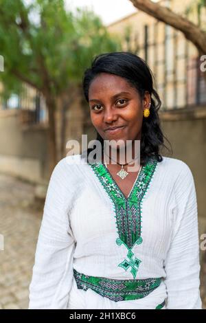 Mekelle, Ethiopia - April 28, 2019: Ethiopian beautiful woman with traditional costume on the street in Mekelle, second largest city and capital of Ti Stock Photo