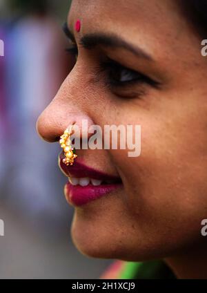 HYDERABAD-INDIA-JUNE 04,2019:Close-up portrait of a Indian Maharastrian woman in tradtional dress and jewelry on a festival day Stock Photo