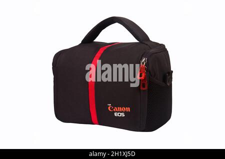 Canon EOS digital cameras designed for red striped black bag, isolated on a white background, October 24, 2020 Istanbul Turkey Stock Photo