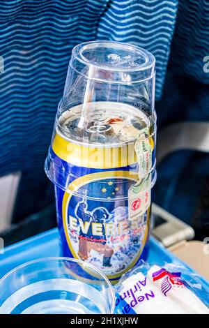 Kathmandu Nepal 21. Mai 2018 Can of Everest beer on the plane of Nepal Airline. Stock Photo