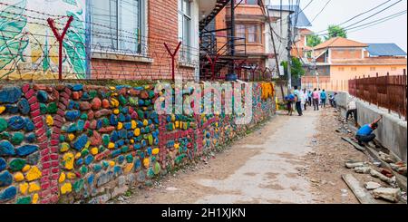 Kathmandu Nepal 21. Mai 2018 Colorful dirty and dusty street and area in Sinamangal, Kathmandu, Nepal. Stock Photo