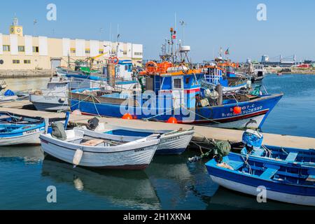 small colorful fishing boat in the port of Setubal, Portugal Stock Photo -  Alamy