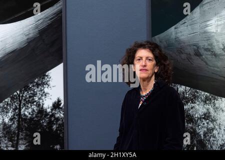 London, UK.  19 October 2021.  Swiss-French photographer Hélène Binet poses ahead of her new exhibition “Light Lines: The Architectural Photographs of Hélène Binet” at the Royal Academy of Arts.  The exhibition spans Binet’s career, showcasing around 90 images of more than 20 projects by 12 architects and runs 23 October 2021 to 23 January 2022.  Credit: Stephen Chung / Alamy Live News Stock Photo