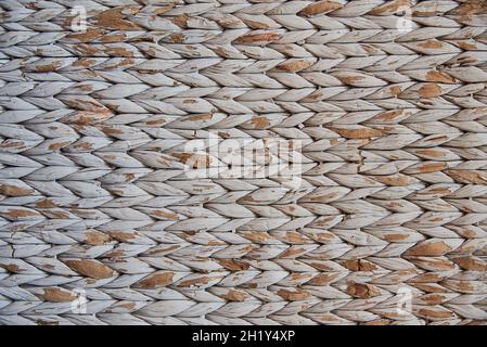 Abstract natural braided from vine, straw, cotton background. Full frame braided surface as a backdrop. Stock Photo