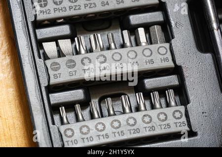 Screwdriver bits in a toolbox Stock Photo