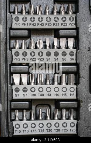 Screwdriver bits in a toolbox Stock Photo