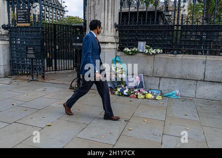 weSTMINSTER LONDON, UK. 19th Oct, 2021. Floral tributes are placed by supporters from Iran following the death of Sir David Amess at his constituency surgery in Leigh-on-Sea Essex on 15 October. Credit: amer ghazzal/Alamy Live News Stock Photo