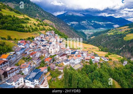 Stelvio village or Stilfs in Dolomites Alps landscape aerial view, province of South Tyrol in northern Italy. Stock Photo