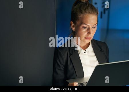 IT engineer specialist working in network server room Stock Photo