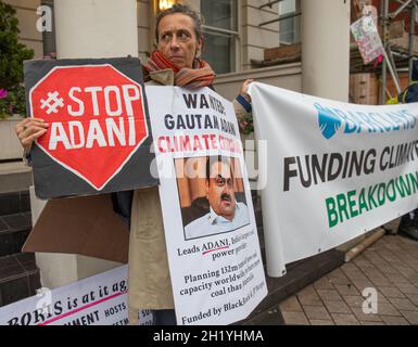 Science Museum, London, England, UK 19 October 2021 Bank bosses and government ministers attend 'Green' Investment summit at the Science Museum, as a small number of activists line the street in protest at the participation of fossil fuel agencies including JP Morgan, Adani and others Credit: Denise Laura Baker/Alamy Live News Stock Photo