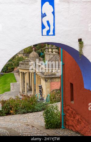 Portmeirion village, Gwynedd, North Wales - view through archway to Bristol Colonnade in October - tourist village Stock Photo
