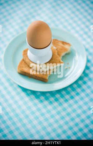 Egg in eggcup on toast Stock Photo