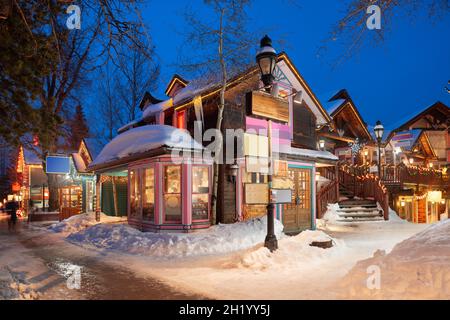 Breckenridge, Colorado, USA downtown streets at night in the winter with holiday lighting. Stock Photo