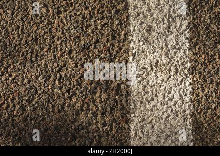 Background from asphalt and dividing strip, top view Stock Photo