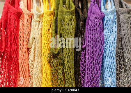 Shopping string bags of different colors. Eco-friendly shopping bag made from natural materials. Zero waste concept. High quality photo Stock Photo
