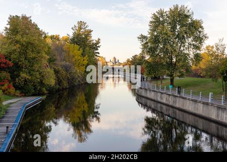 Ottawa, Canada - October 11, 2021: Rideau Canal, Hog's Back Locks in Ottawa, Canada. Autumn season in park with river Stock Photo
