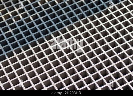 Mesh textured metal panel. Gray steel industrial surface Stock Photo