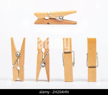 stack of clothespins on isolated white background. Stock Photo