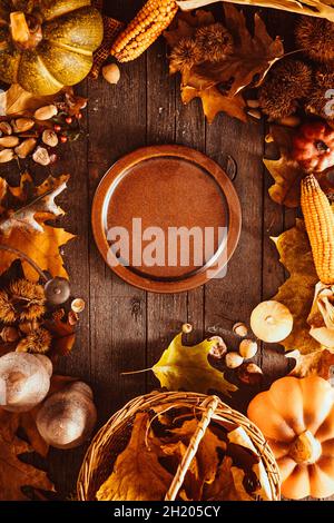 Thanksgiving dinner, autumn fruit with plate and cutlery Stock Photo