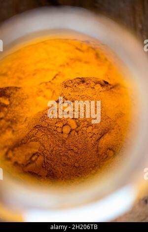 Turmeric powder (seen from above) Stock Photo