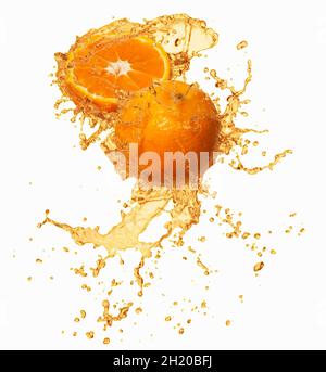Oranges with a splash of juice Stock Photo