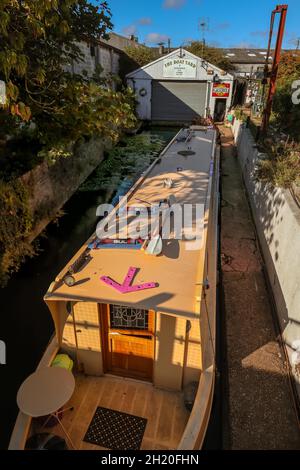 Traditional boatyard with narrowboat on the Great Ouse River at Ely Cambridgeshire England Stock Photo