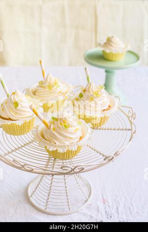 Lemon and vanilla cupcakes on a cake stand Stock Photo