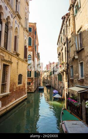 VENICE, ITALY - May 20, 2016: A water canal between old homes in the city center Stock Photo