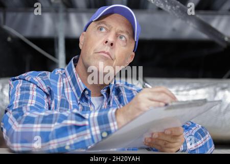 man doing stocktaking of product Stock Photo