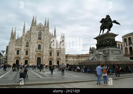 Statue of Vittorio Emanuele II at Piazza Duomo overlooking the Milan Cathedral (Duomo di Milano) on a gloomy day. Stock Photo