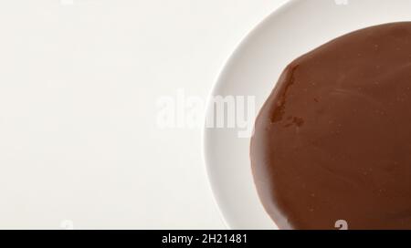 Plate full of liquid pastry chocolate Stock Photo