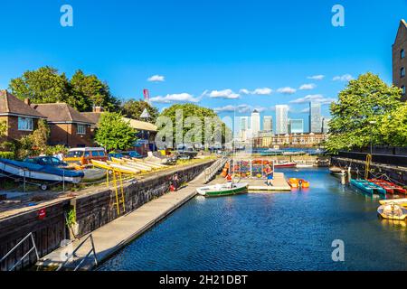 Shadwell Basin Outdoor Activity Centre with Canary Wharf in the background, London, UK
