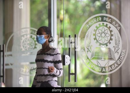 Addis Ababa, Ethiopia. 14th Oct, 2021. A student enters an office building at Addis Ababa University in Addis Ababa, Ethiopia, on Oct. 14, 2021. Ethiopia's Addis Ababa University (AAU) announced that it has finalized preparations to launch its first-ever Master of Arts (MA) program in the Chinese language in Ethiopia. Credit: Michael Tewelde/Xinhua/Alamy Live News Stock Photo
