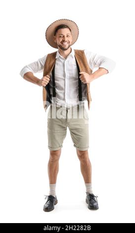 Handsome young man in traditional German clothes on white background Stock Photo